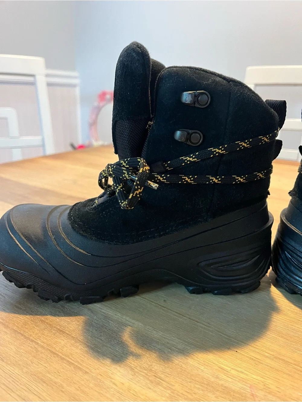 The North Face Black Boots with Yellow-Accent Laces